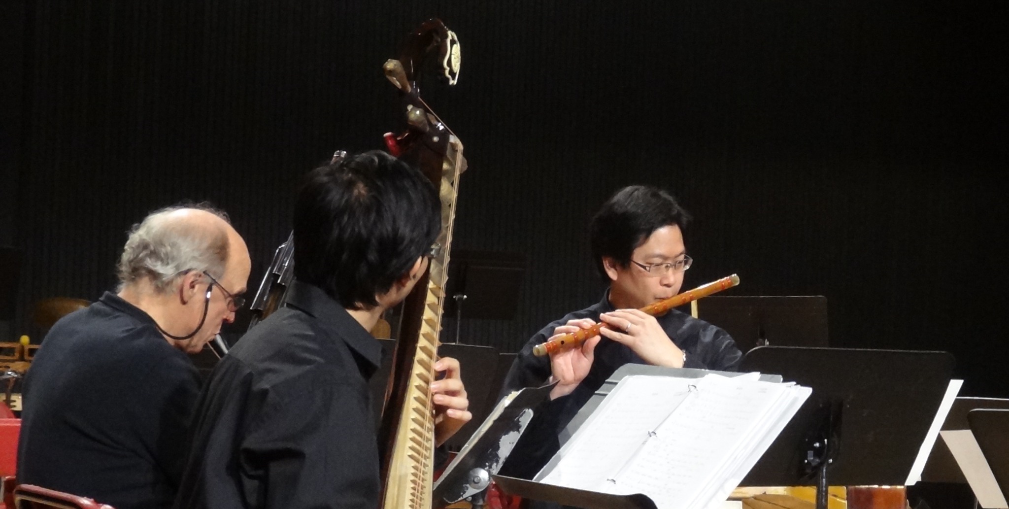 Po-Wei Weng playing dizi alongside a pipa player in a Chinese music ensemble