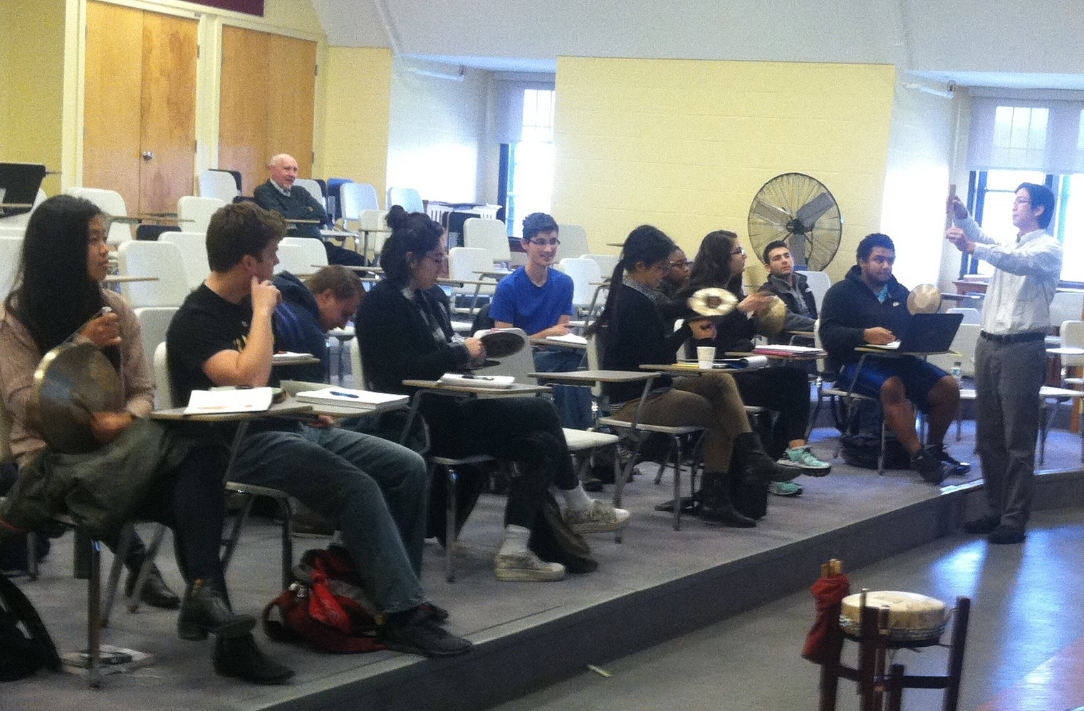 Po-Wei Weng leading college students in a participatory Peking Opera percussion workshop